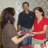 Susan Presents the Team One Gift to Kabi